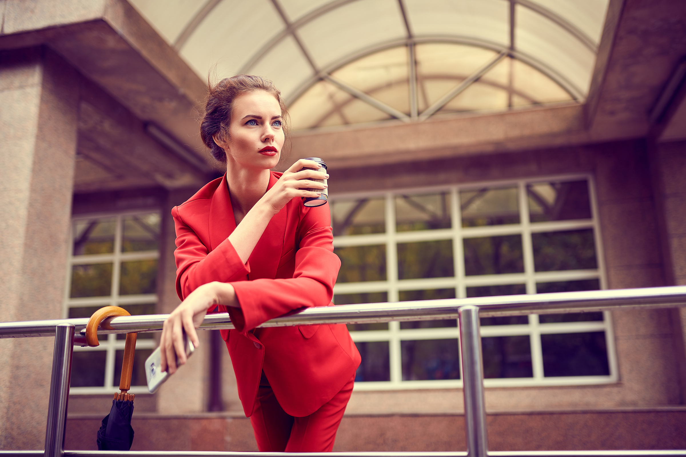 Lady in Red Taking Coffee Break Outdoors